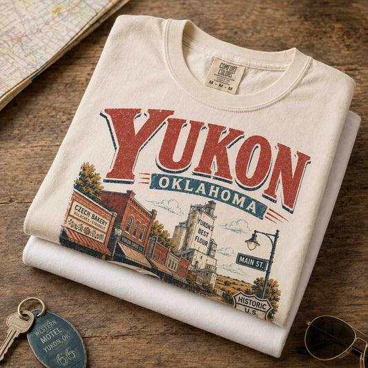 Folded Yukon Oklahoma Route 66 Czech Heritage graphic tee with vintage artwork visible