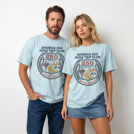 America 250 Road Trip Club Route 66 graphic tee with vintage badge artwork, highway, motel sign, mountains, flags, and 1776 2026 details.