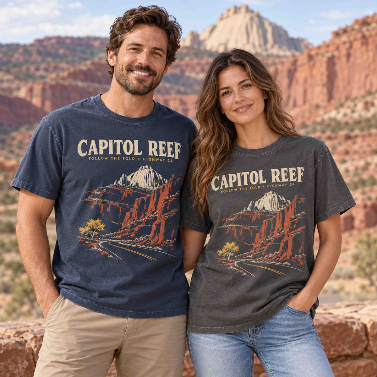 Couple wearing Navy and Pepper Capitol Reef National Park vintage graphic tees in Utah red rock landscape.