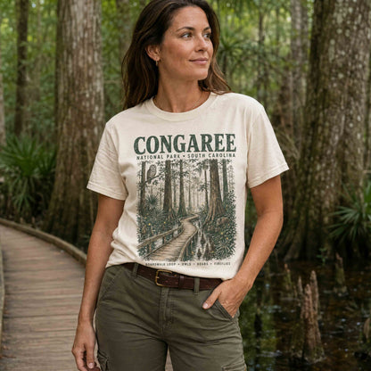 Congaree National Park South Carolina graphic tee worn by a couple in a forest setting