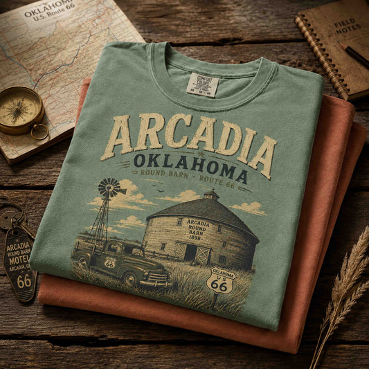 Male model wearing an Arcadia Oklahoma Route 66 Historic Round Barn graphic tee.
