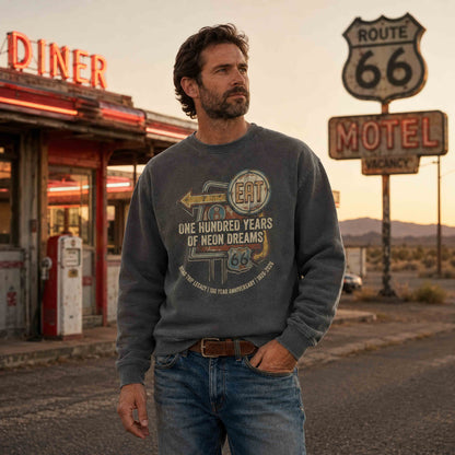 Man wearing Pepper Route 66 Centennial graphic crewneck sweatshirt on historic Route 66