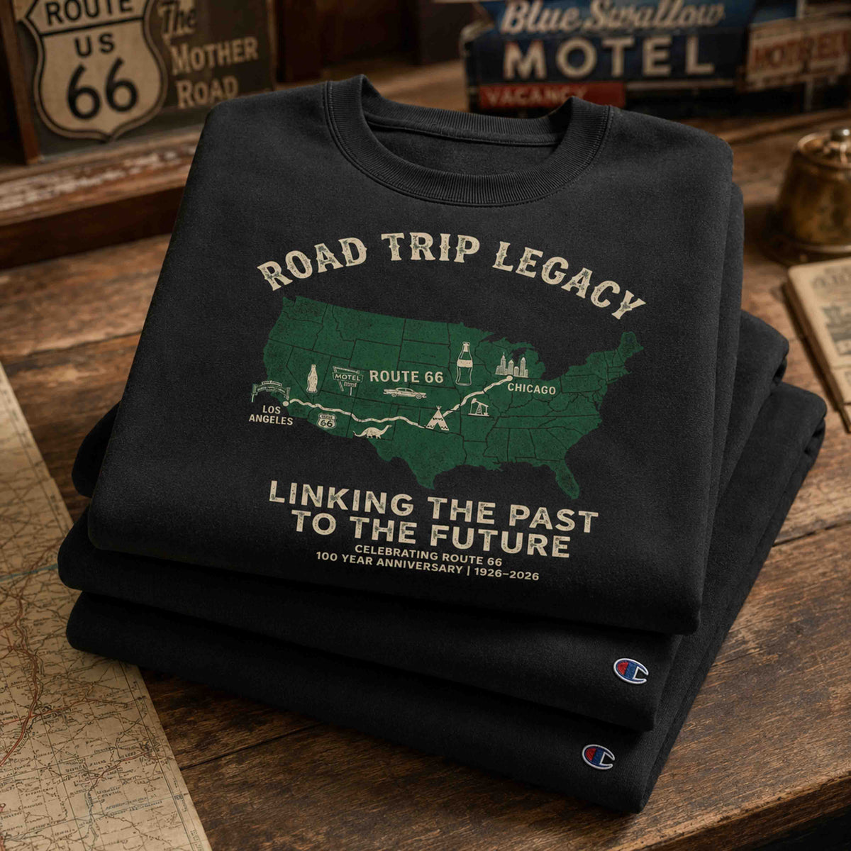 Male model wearing black Champion Powerblend Route 66 Road Trip Legacy graphic sweatshirt