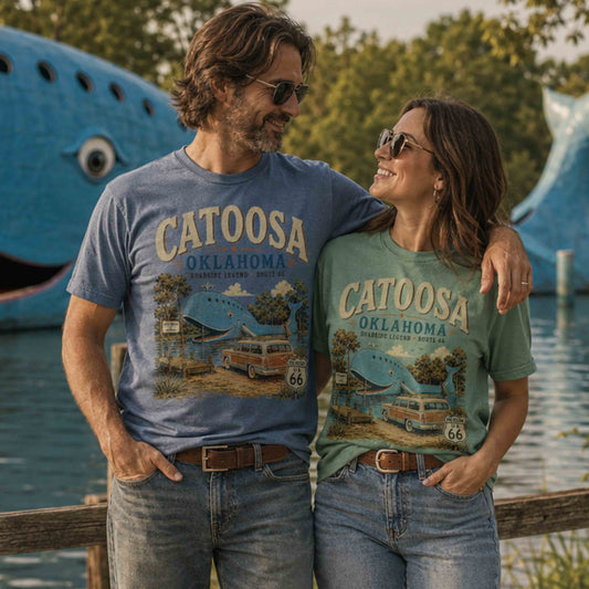 Couple wearing Catoosa Oklahoma Route 66 Blue Whale graphic tees at the Blue Whale of Catoosa