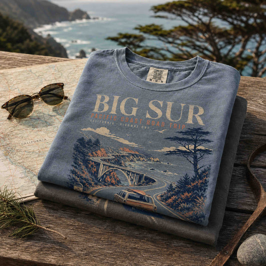 Close-up of Big Sur California Pacific Coast Road Trip graphic tee with vintage coastal artwork.