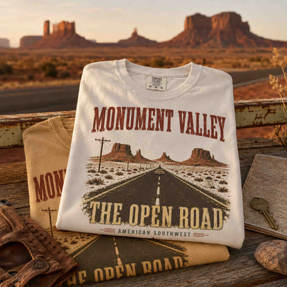 Model wearing ivory Monument Valley desert road trip graphic tee outdoors