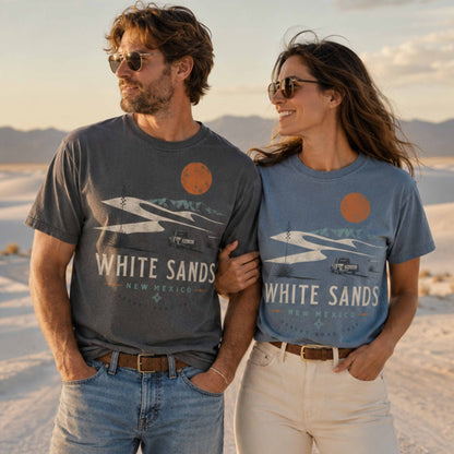 Couple wearing White Sands New Mexico Desert Road Trip graphic tees at White Sands dunes