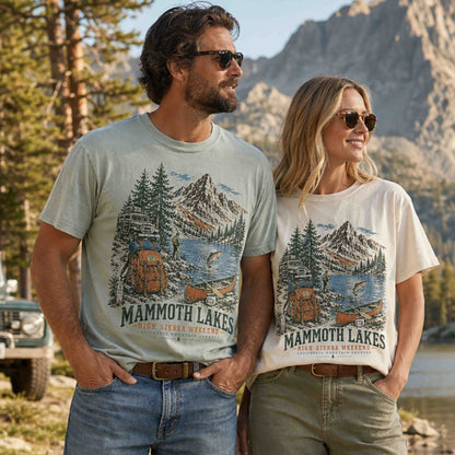Couple wearing Mammoth Lakes California High Sierra Weekend graphic tees in a scenic mountain setting