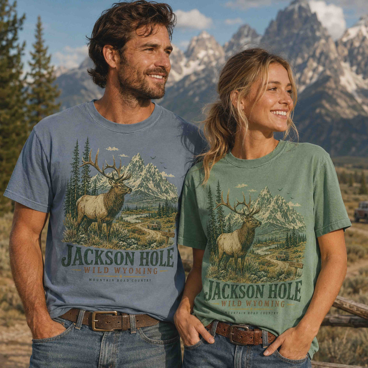 Couple wearing Jackson Hole Wild Wyoming Grand Teton graphic tees in a scenic Wyoming mountain setting