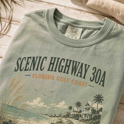 Close-up of Scenic Highway 30A vintage coastal artwork on premium cotton tee