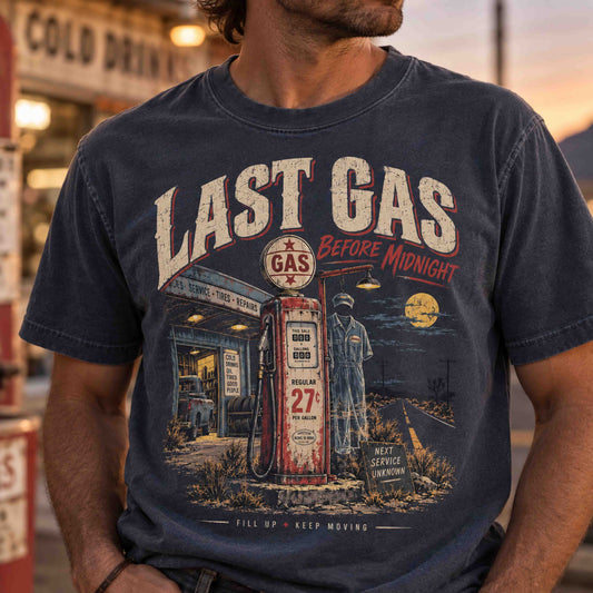 Close-up of a woman modeling the pepper Last Gas Before Midnight shirt featuring distressed vintage gas station artwork.