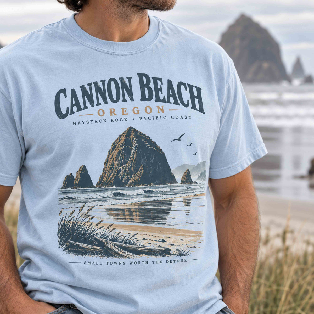 Cannon Beach Oregon Haystack Rock graphic tee in Chambray featuring vintage Pacific Coast beach artwork.