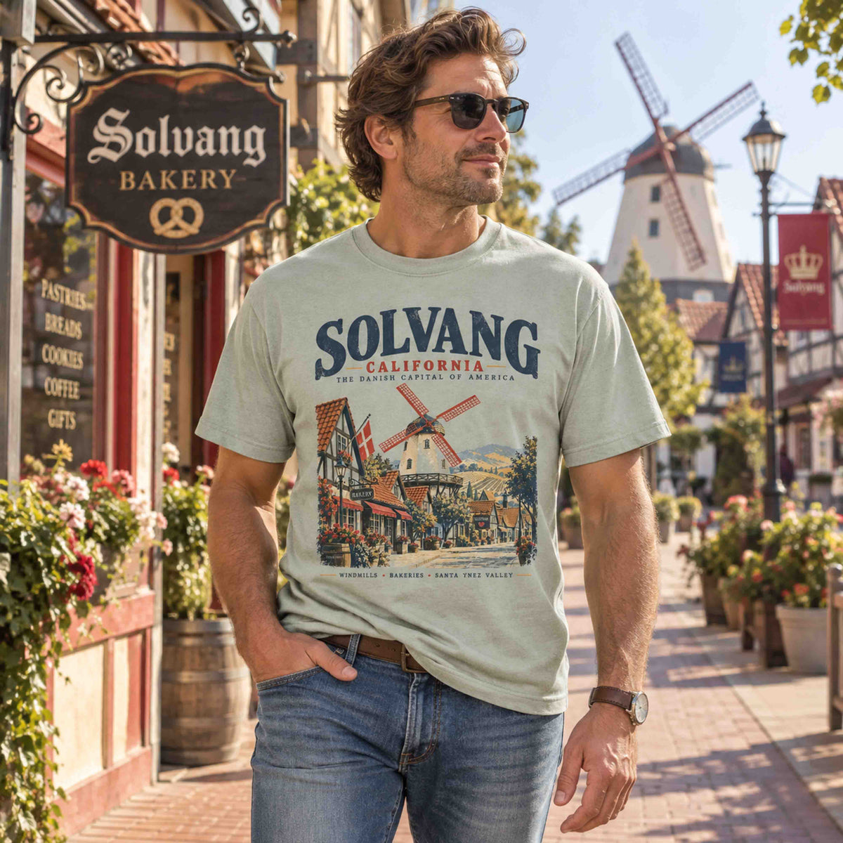 Lifestyle view of Solvang Danish windmill graphic tee inspired by California Central Coast travel