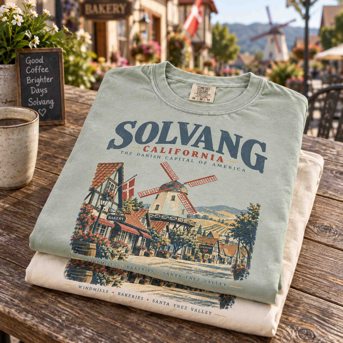 Close-up of vintage Solvang California tee artwork with Danish windmill and village architecture