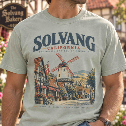 Model wearing a Solvang California Danish windmill graphic tee with vintage Santa Ynez Valley artwork