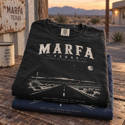 Marfa Texas Lights in the High Desert vintage graphic tee with desert road, mountain silhouettes, agave plants and night sky