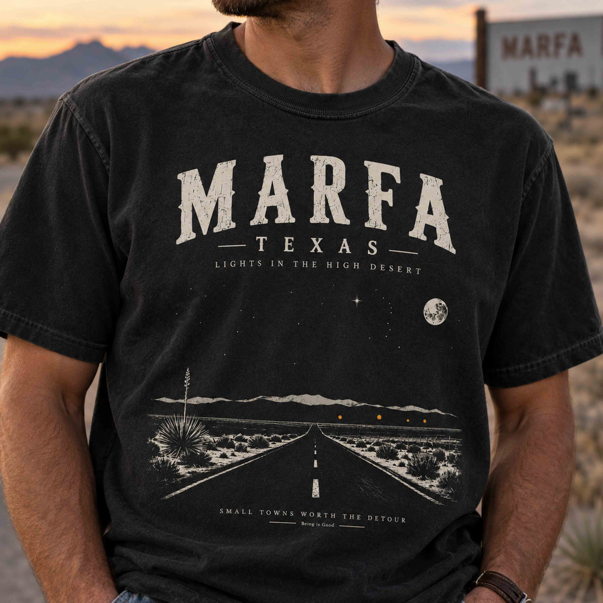 Marfa Texas road trip graphic tee in high desert setting inspired by the mysterious Marfa Lights and West Texas landscape