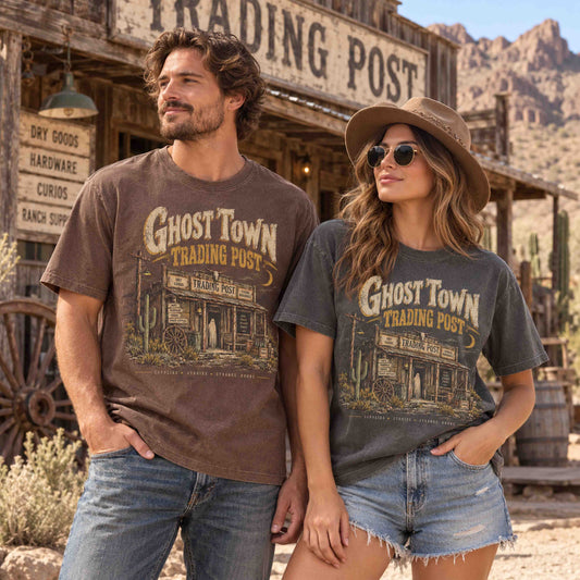 Couple wearing Ghost Town Trading Post vintage western graphic tees at an Old West desert trading post