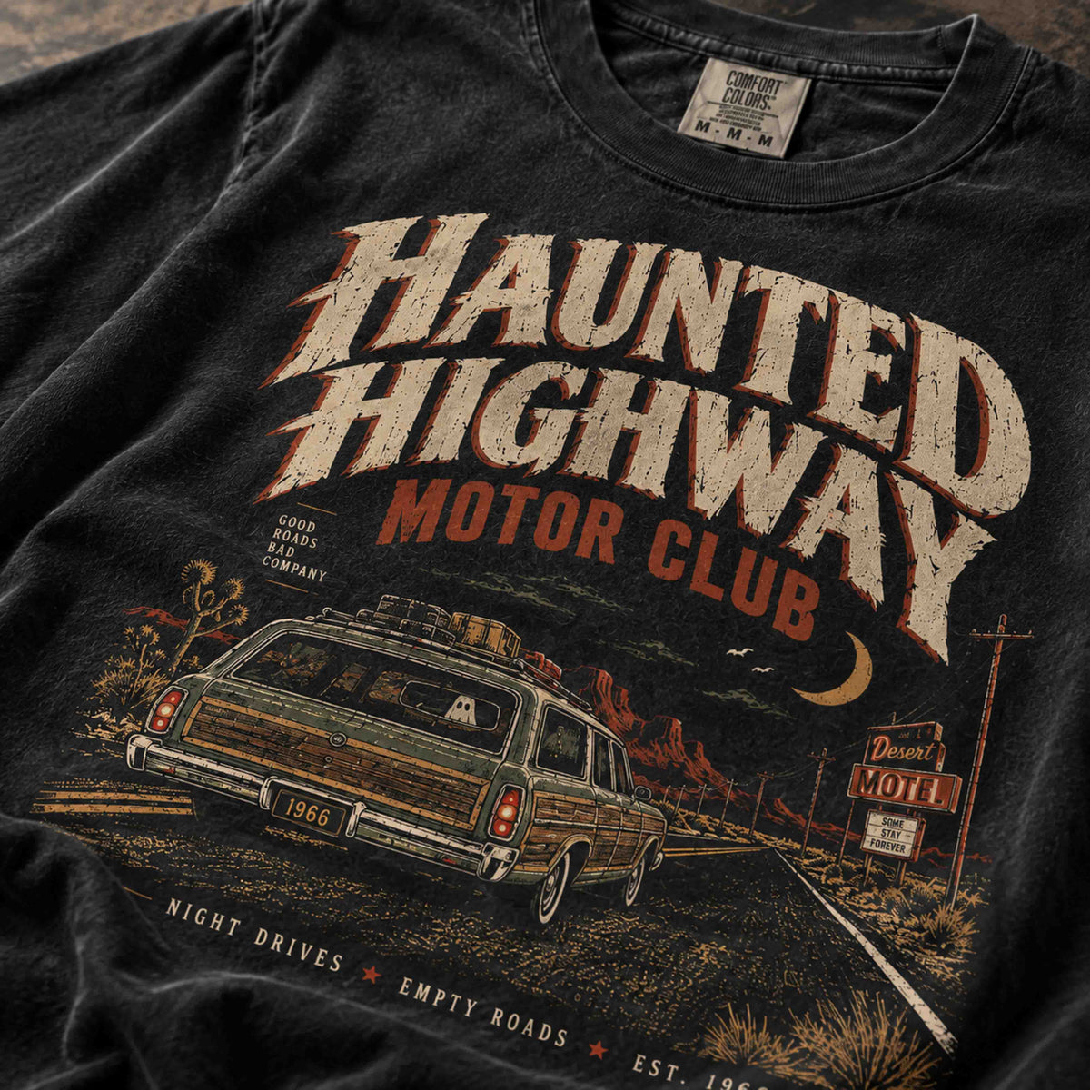 Haunted Highway Motor Club vintage graphic tee lifestyle mockup with retro desert highway artwork