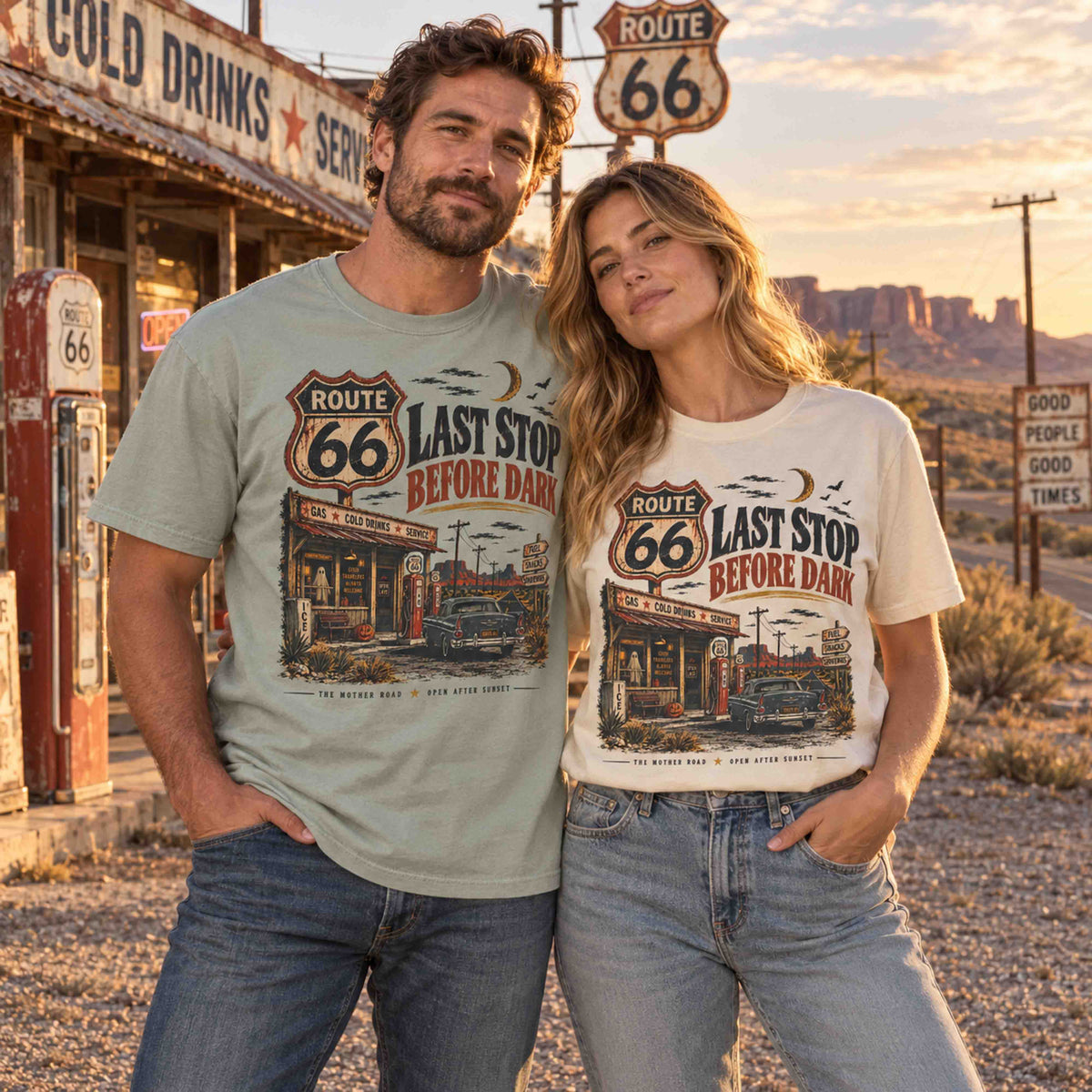 Couple wearing Route 66 Last Stop Before Dark vintage graphic T-shirts at a desert roadside stop