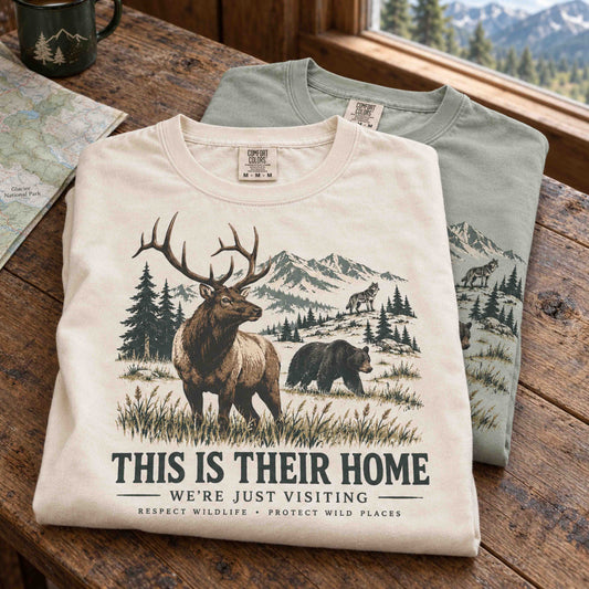 This Is Their Home wildlife respect nature graphic tee with elk, bear, alpine scenery, and conservation-inspired artwork.