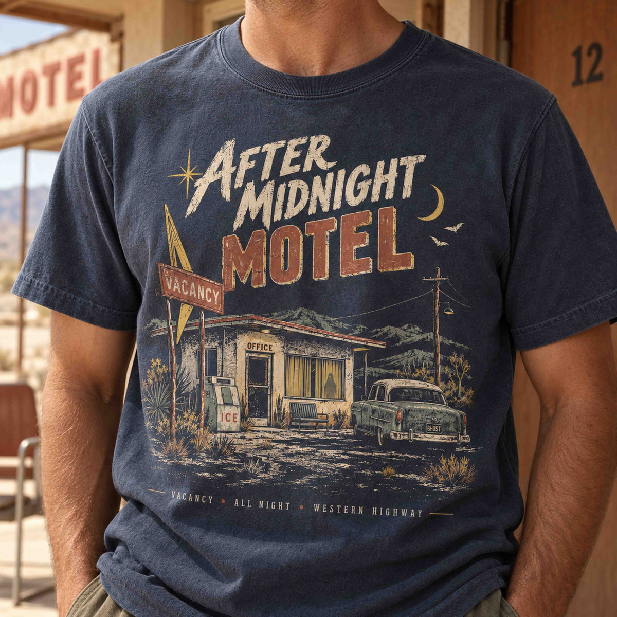 Close-up of the After Midnight Motel design on a Navy T-shirt.