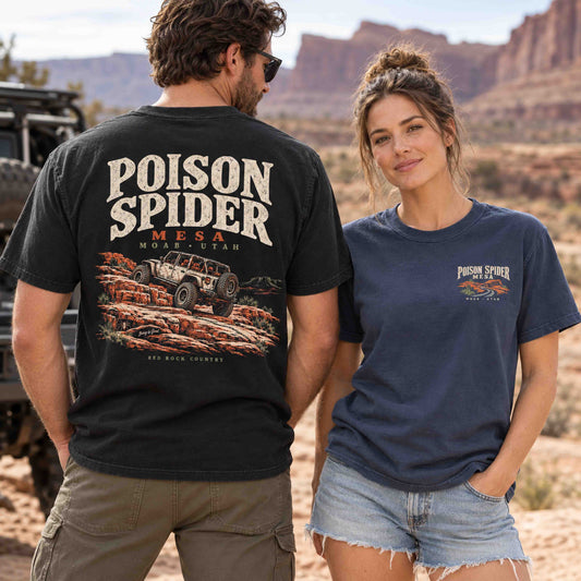 Couple wearing Being is Good Poison Spider Mesa tees, showing the Black back graphic and Navy left-chest print.