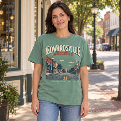 Woman wearing a Light Green Edwardsville Historic Route 66 graphic tee with vintage Mother Road design