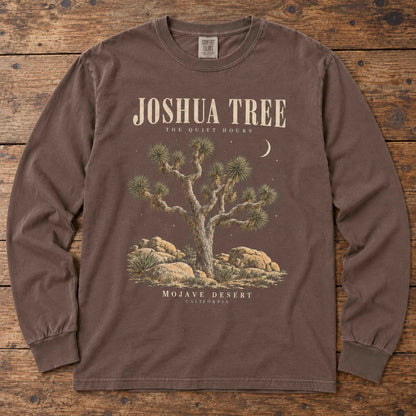 Espresso Joshua Tree long sleeve shirt laid flat, showing tree, boulders, crescent moon and The Quiet Hours lettering.