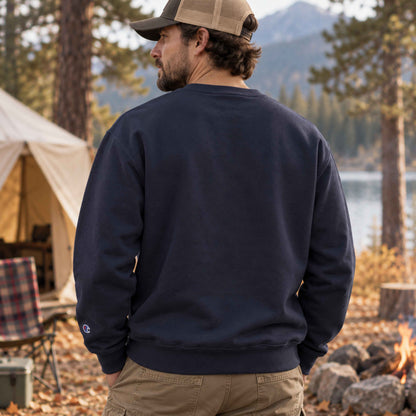 Back view of Navy Champion unisex sweatshirt showing relaxed fit, blank back and sleeve detail