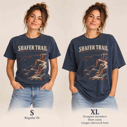 Woman comparing size S and XL fits of the Navy Shafer Trail Comfort Colors 1717 T-shirt.