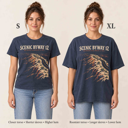 Side-by-side comparison of women wearing the navy Scenic Byway 12 T-shirt in sizes S and XL.