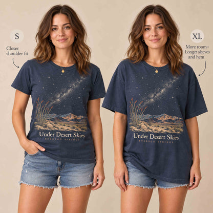 Same woman wearing the Navy Under Desert Skies Borrego Springs T-shirt in Small and XL for an illustrative fit comparison.
