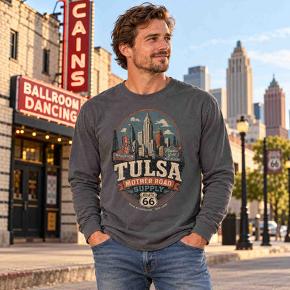 Man wearing a Pepper Tulsa Route 66 long sleeve graphic tee outside a venue with a Cain's Ballroom sign.
