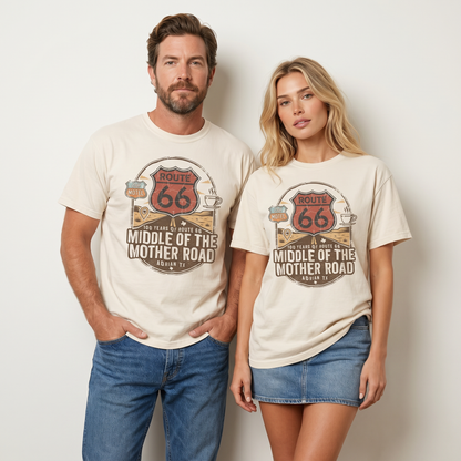 Route 66 Middle of the Mother Road graphic t-shirt featuring red highway shield, desert road scene, and Adrian Texas midpoint design.