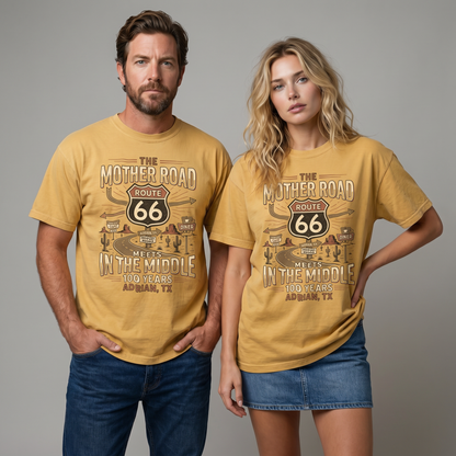 Route 66 Mother Road graphic t-shirt featuring vintage shield design, desert road scene, and Adrian Texas midpoint 100 years anniversary text.