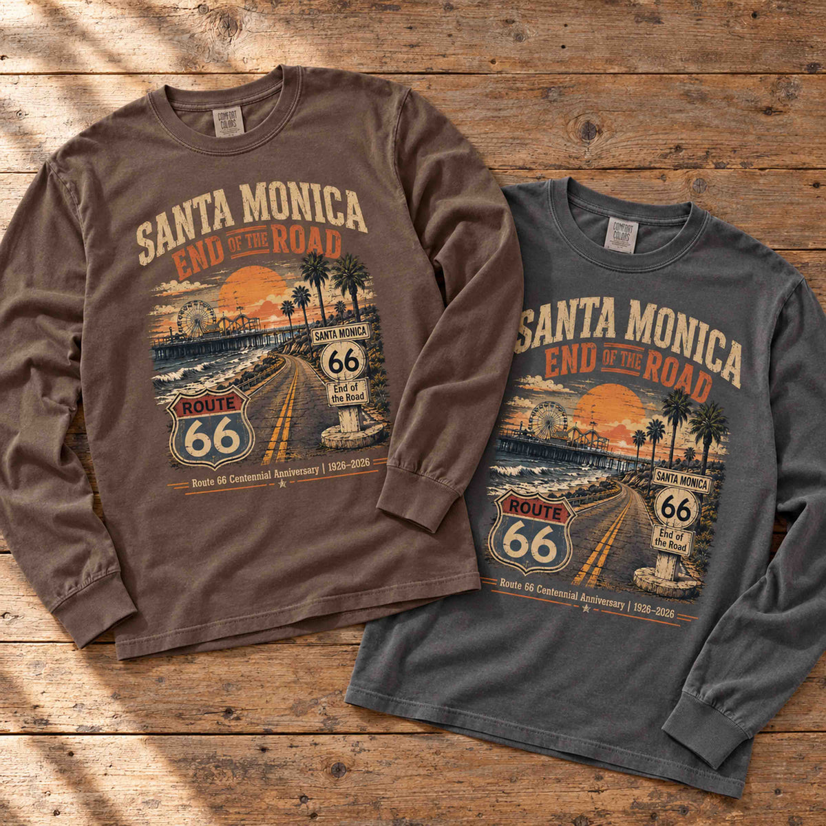 Espresso and Pepper Santa Monica Route 66 End of the Road long sleeve graphic tees arranged flat on a wooden table.