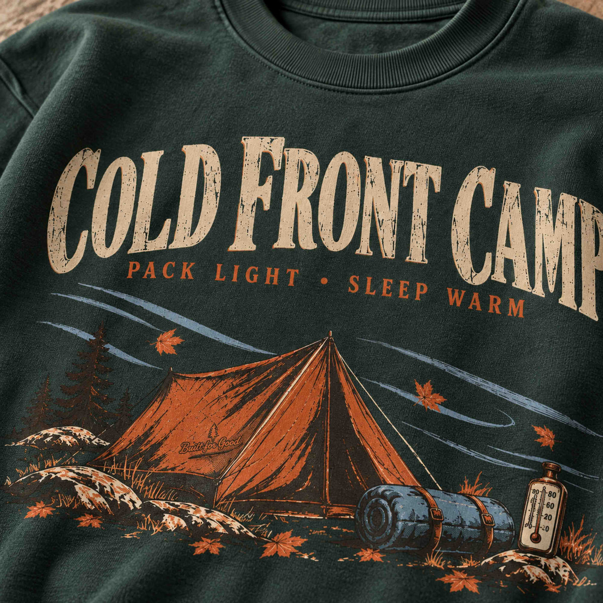 Close-up of Cold Front Camp camping graphic on Navy sweatshirt showing print detail and fleece texture