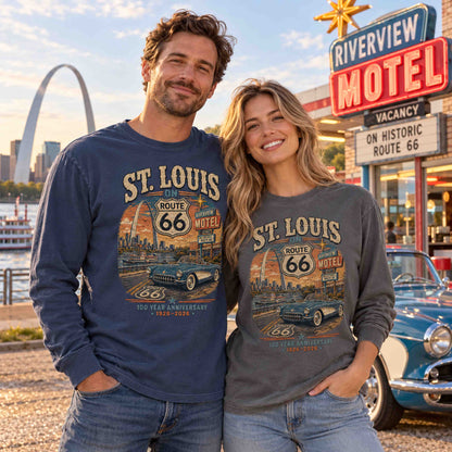 Man in Navy and woman in Pepper wearing St. Louis Route 66 long sleeve tees with Gateway Arch, classic convertible and centennial graphics.