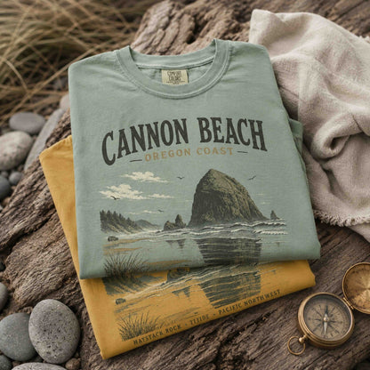 Folded Cannon Beach Oregon Coast graphic t-shirts in Bay and Mustard