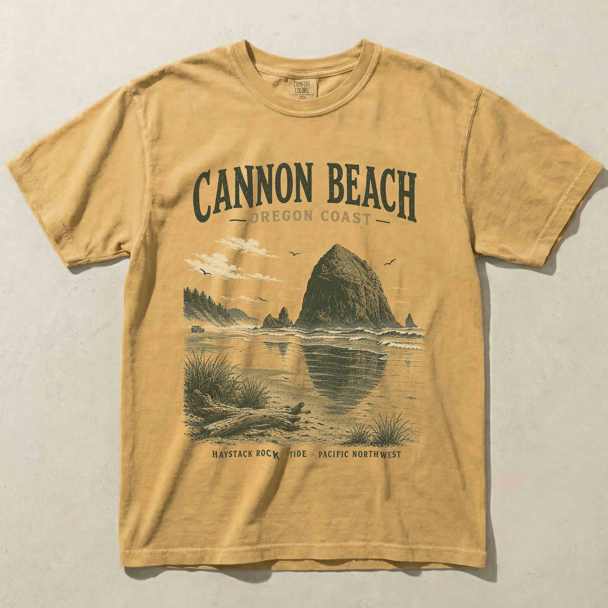 Cannon Beach Oregon Coast graphic t-shirt in Mustard featuring Haystack Rock