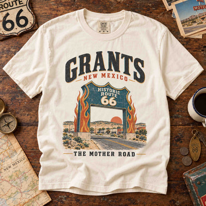 Being is Good Grants Route 66 Ivory tee laid flat on a vintage wooden table