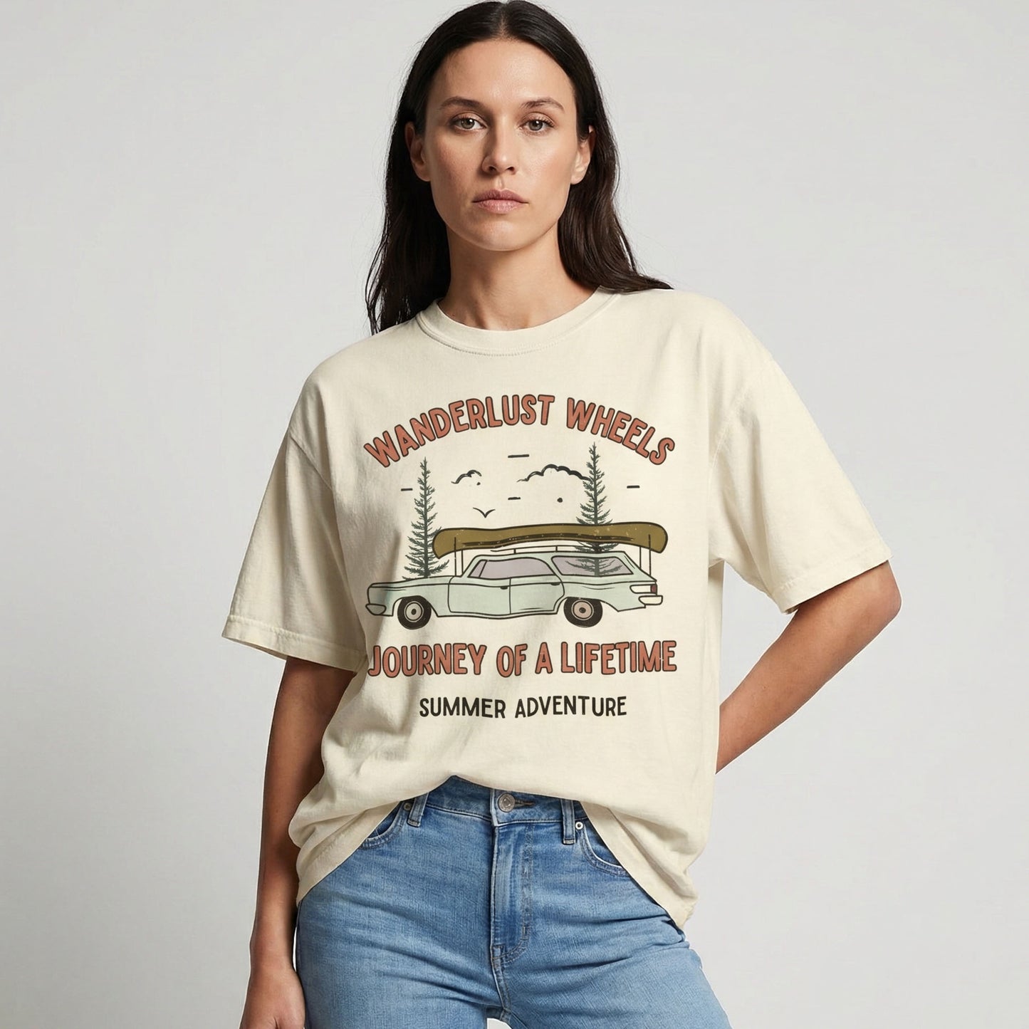"Wanderlust Wheels tee lifestyle shot showing relaxed fit and soft vintage-inspired fabric"
