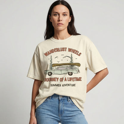 "Wanderlust Wheels tee lifestyle shot showing relaxed fit and soft vintage-inspired fabric"
