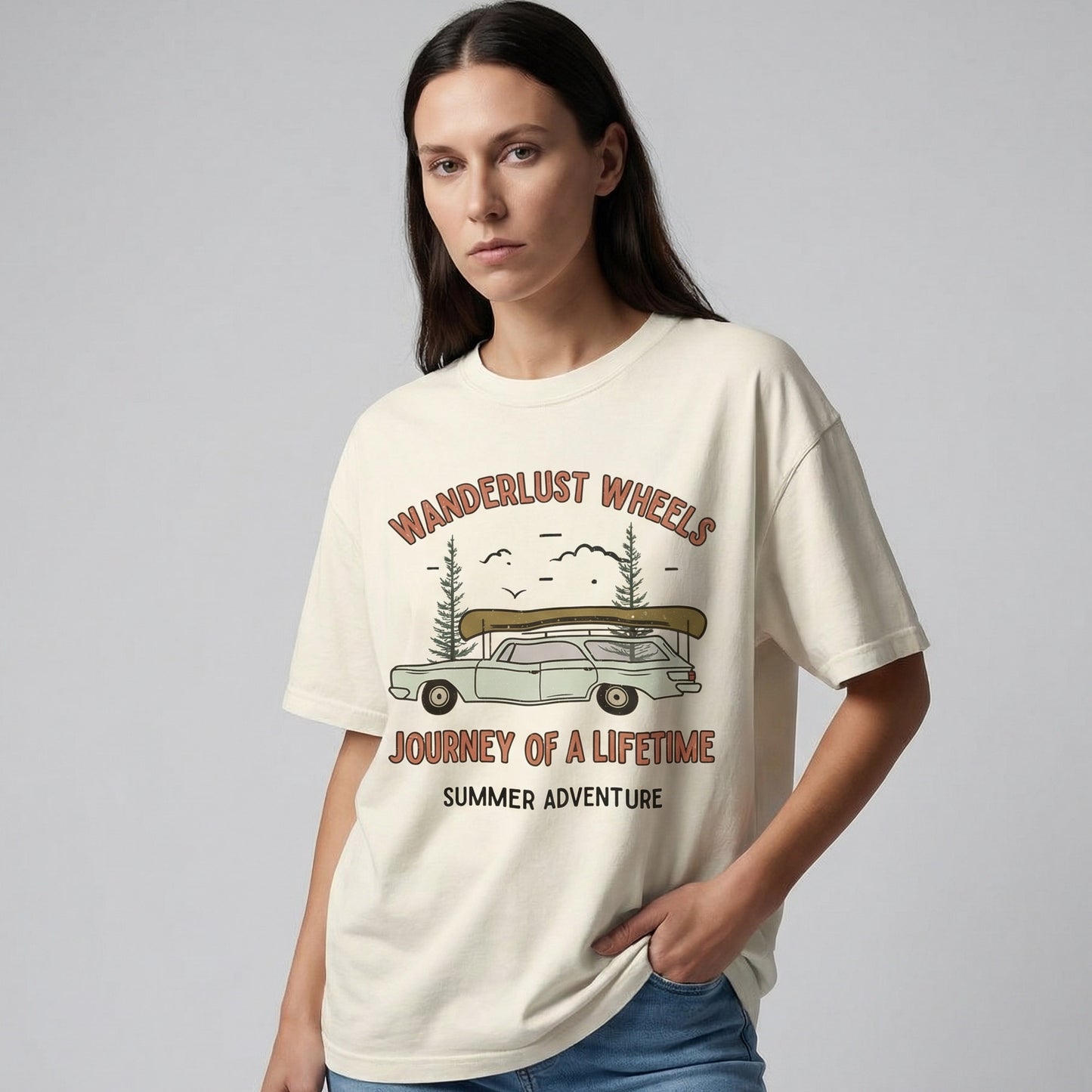 "Ivory Wanderlust Wheels vintage station wagon graphic tee with minimalist line art design and canoe on roof"
