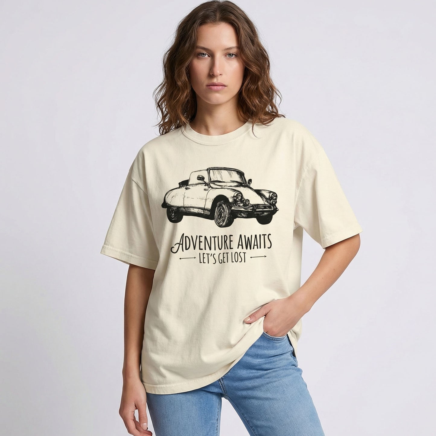 "Adventure Awaits tee lifestyle shot showing relaxed fit and soft vintage-inspired fabric"
