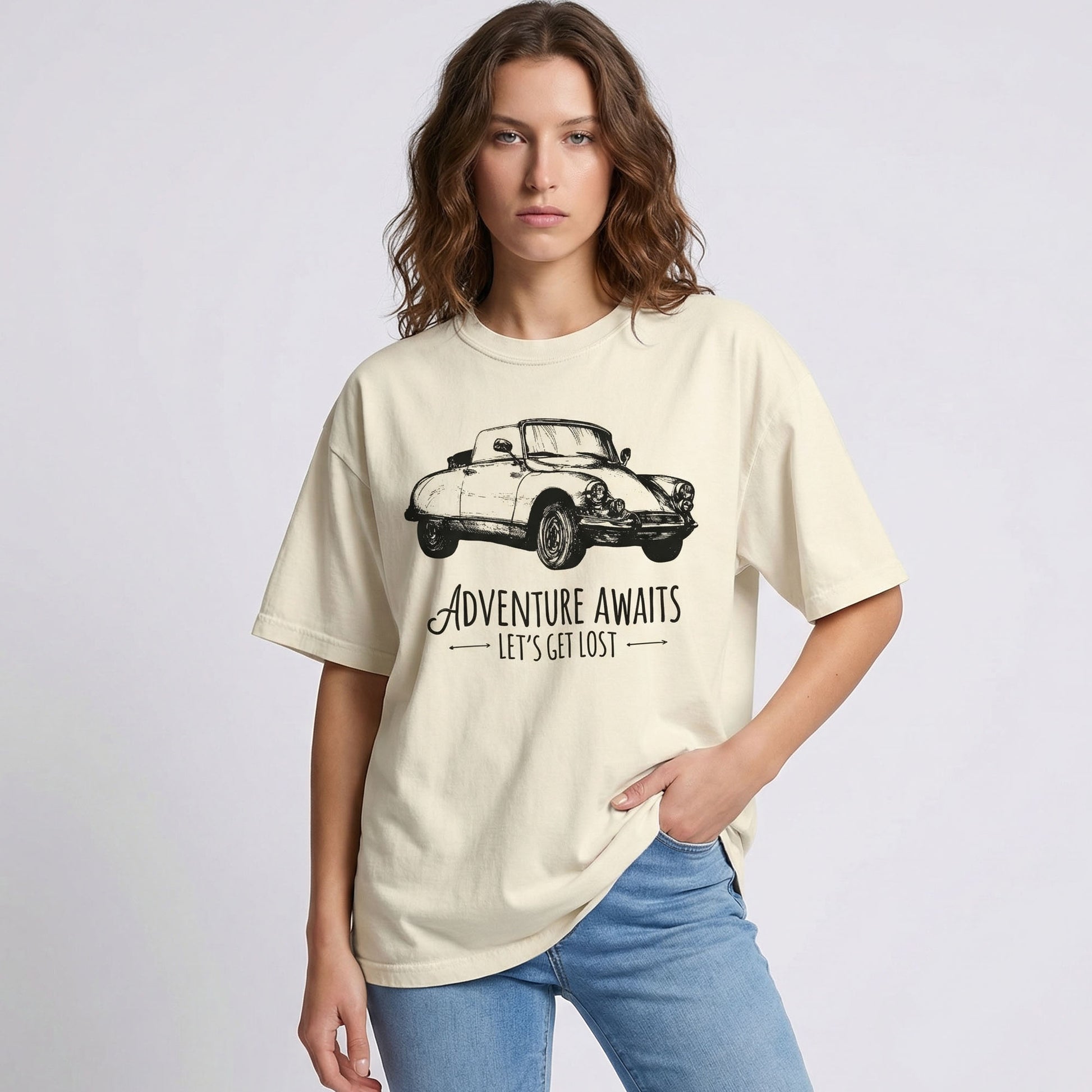 "Adventure Awaits tee lifestyle shot showing relaxed fit and soft vintage-inspired fabric"
