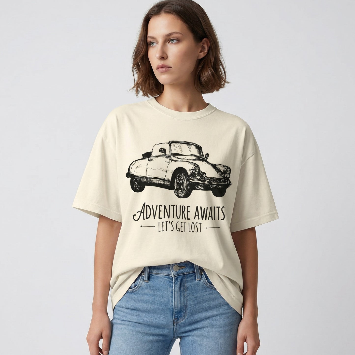 "Back view of Adventure Awaits vintage car graphic tee in ivory colorway"
