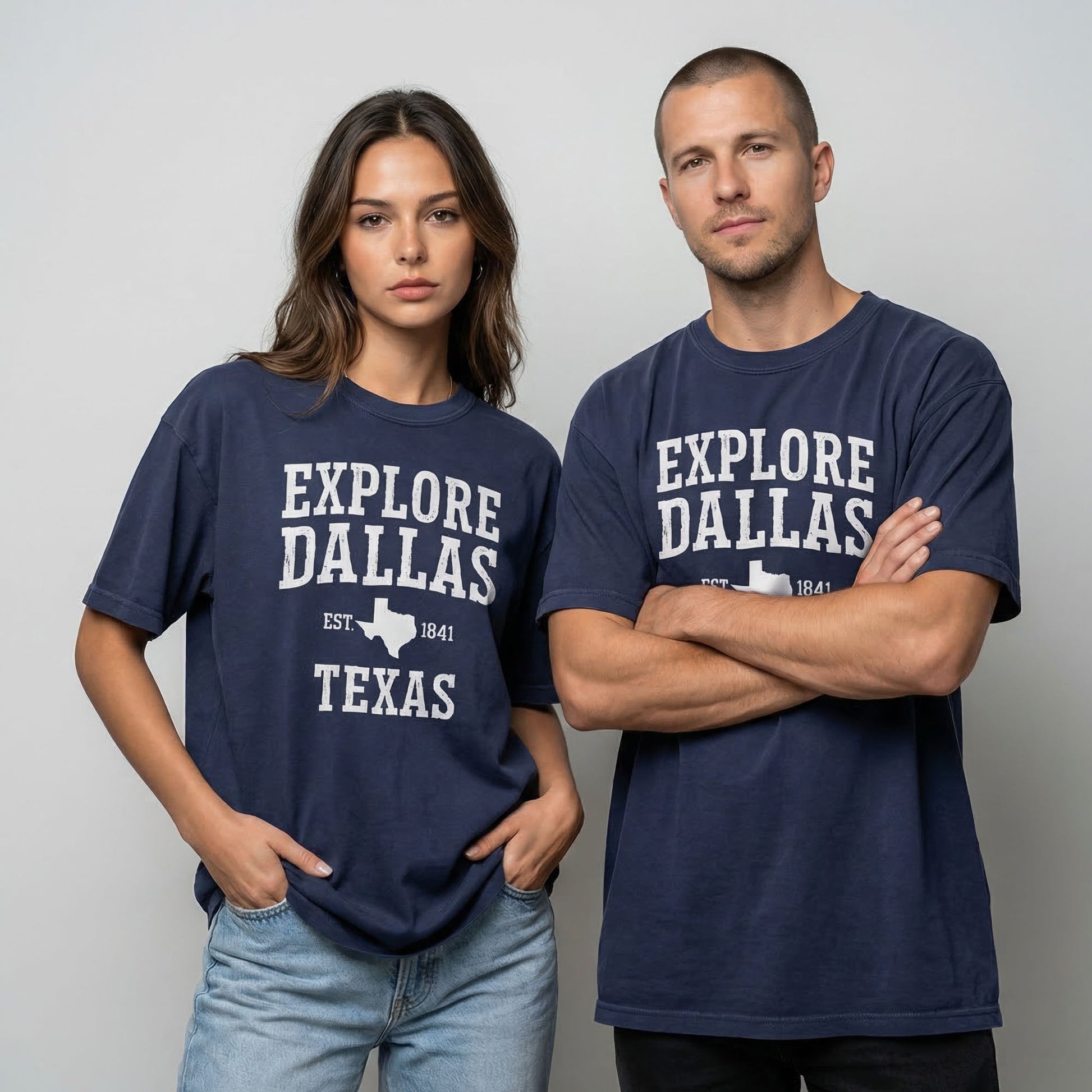 Model wearing Navy Explore Dallas Typography Tee - relaxed fit premium lifestyle tee