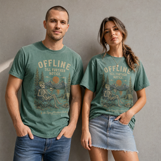 Vintage outdoor graphic tee featuring a skeleton sitting in a camping chair by a lake with mountains, pine trees, tent, sunset, and text reading Offline Till Further Notice No Signal Outdoor Club.